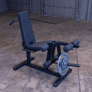 Body-Solid GLCE365B leg extension & curl machine – plate loaded, three-quarter view