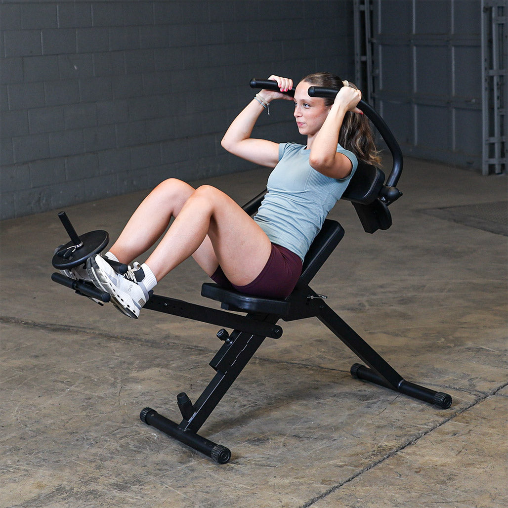 Best Fitness BFAB20B AB Mantis Bench — weighted ab crunch, front view with feet under the loaded foot post