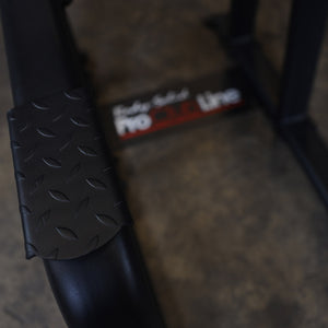 Body-Solid SVKR1000B Pro ClubLine Vertical Knee Raise — diamond-plate entry step and Pro ClubLine base