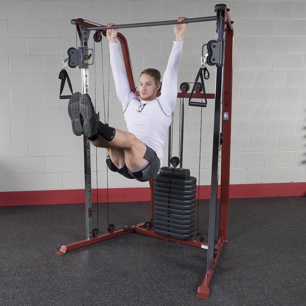 Man performing a standing cable chest press on the Best Fitness BFFT10R functional trainer